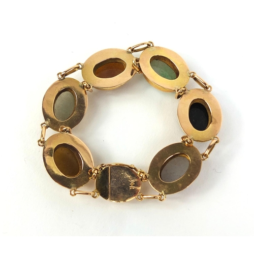 782 - 14ct gold bracelet set with six cabochon polished semi precious stones, 19cm long, approximate weigh... 