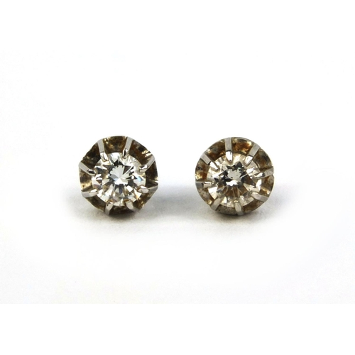 788 - Pair of 18ct white gold diamond solitaire earrings