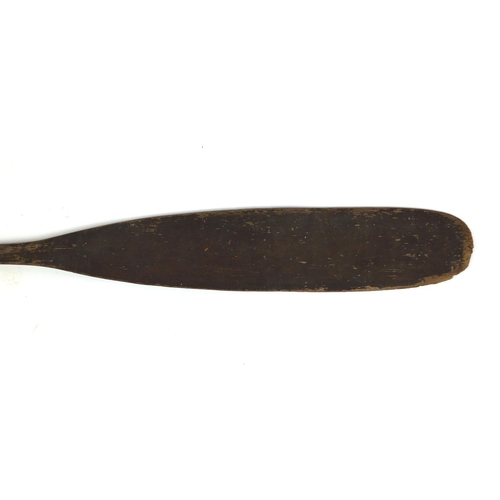 505 - Tribal interest wooden paddle, 137cm long