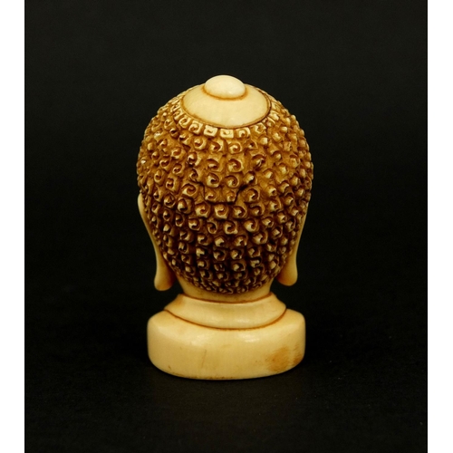 454 - Japanese carved ivory Netski in the form of a Buddha's head, inset character marks to the base, 4.3c... 