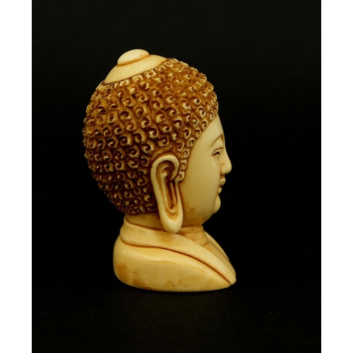 454 - Japanese carved ivory Netski in the form of a Buddha's head, inset character marks to the base, 4.3c... 