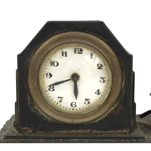 293 - Two Military interest French Art Deco desk clocks, one mounted with an armoured car the other with a... 