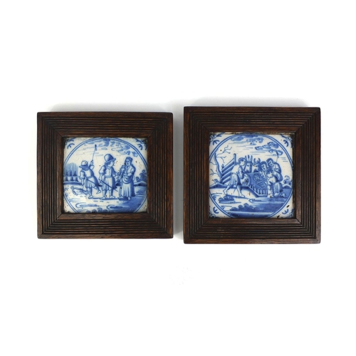 563 - Pair of 18th century Delft blue and white tin glazed tiles, each hand painted with figures one of a ... 