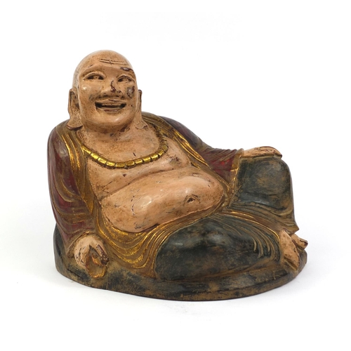 478 - Chinese carved wooden Buddha with hand painted and gilded decoration, 30cm high