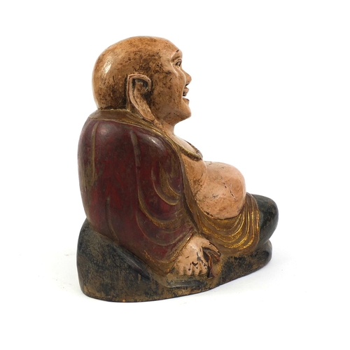 478 - Chinese carved wooden Buddha with hand painted and gilded decoration, 30cm high