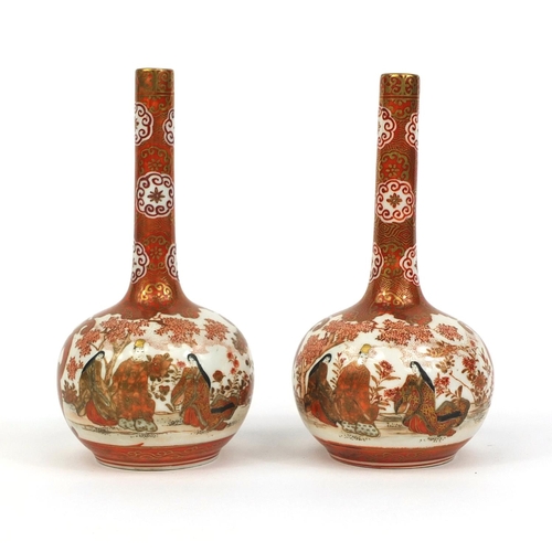 427 - Pair of Japanese Kutani porcelain bottle vases, hand painted with figures in an exterior amongst flo... 