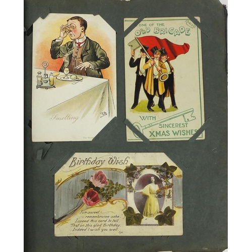 195 - Postcard album containing mostly Military interest postcards, some comical including one of the capt... 