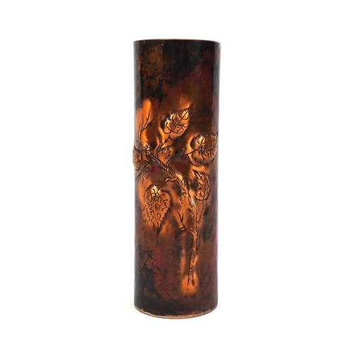 639 - Unmarked Sam Fanaroff cylindrical copper vase, with embossed and floral decoration, 24cm high