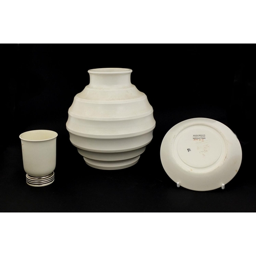 601 - Group of Keith Murray for Wedgwood pottery, comprising a cream football vase, cocktail glass and sau... 