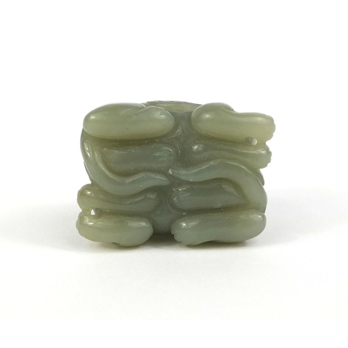 437 - Chinese carved green jade group of two entwined mythical creatures, 3.2cm high