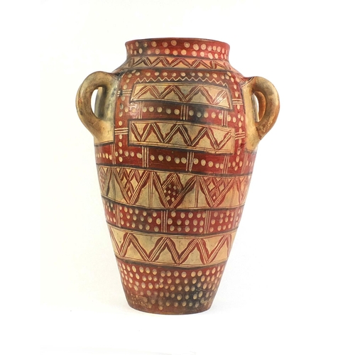 522 - Large Middle Eastern terracotta four handled vessel, finger painted with geometric motifs, 59cm high