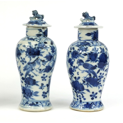 407 - Group of four Chinese blue and white porcelain vases, comprising a baluster example, hand painted wi... 