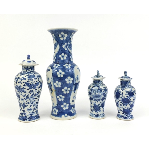 407 - Group of four Chinese blue and white porcelain vases, comprising a baluster example, hand painted wi... 