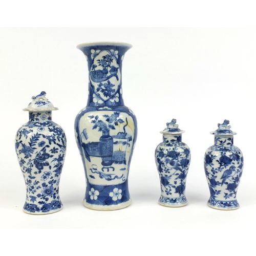 407 - Group of four Chinese blue and white porcelain vases, comprising a baluster example, hand painted wi... 