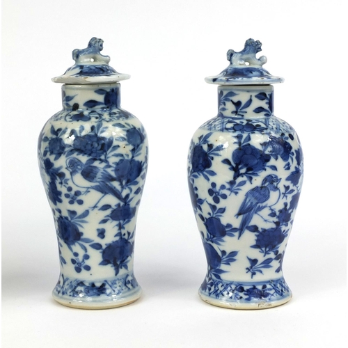 407 - Group of four Chinese blue and white porcelain vases, comprising a baluster example, hand painted wi... 