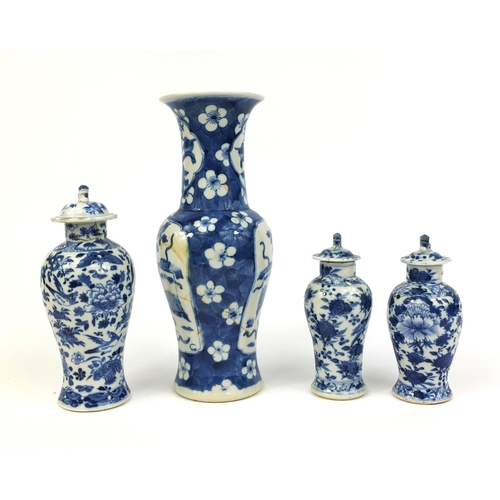 407 - Group of four Chinese blue and white porcelain vases, comprising a baluster example, hand painted wi... 