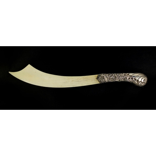 674 - Victorian silver and ivory page turner in the form of a scimitar, the handle profusely embossed with... 