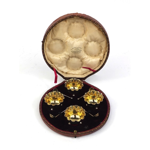 684 - Goldsmiths & Silversmiths of London cased set of four silver salts with gilt interiors and spoons, L... 