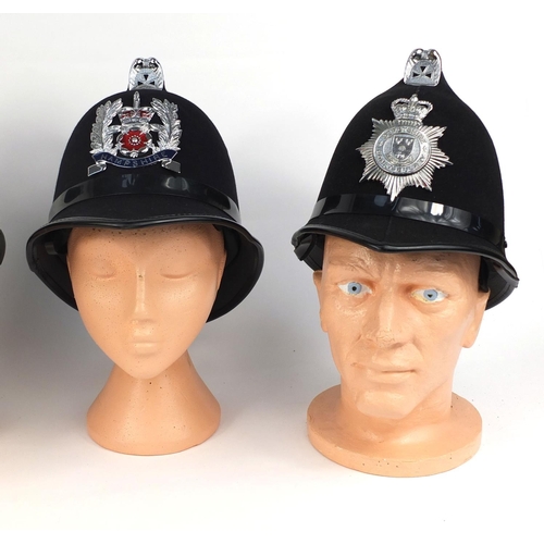 323 - Group of four vintage police Coxcomb helmets, comprising Derbyshire Constabulary, Derby County and B... 