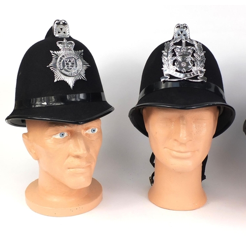 323 - Group of four vintage police Coxcomb helmets, comprising Derbyshire Constabulary, Derby County and B... 