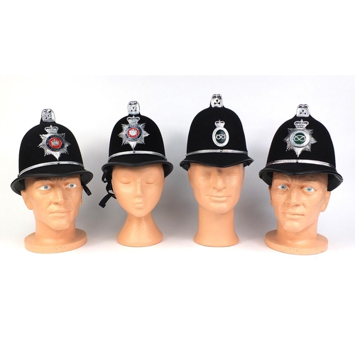 320 - Group of four vintage police Coxcomb helmets, comprising Staffordshire County Police, Staffordshire ... 