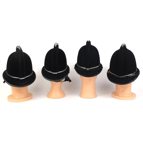 320 - Group of four vintage police Coxcomb helmets, comprising Staffordshire County Police, Staffordshire ... 