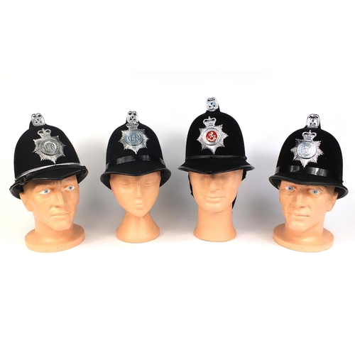 321 - Group of four vintage police Coxcomb helmets, comprising Kent Constabulary, West Yorkshire Metropoli... 