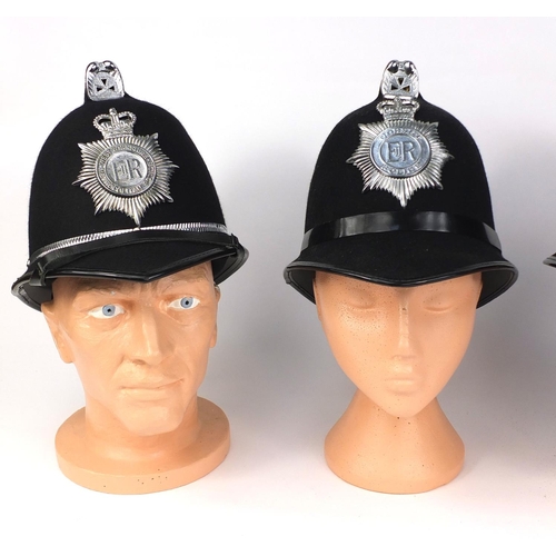 321 - Group of four vintage police Coxcomb helmets, comprising Kent Constabulary, West Yorkshire Metropoli... 