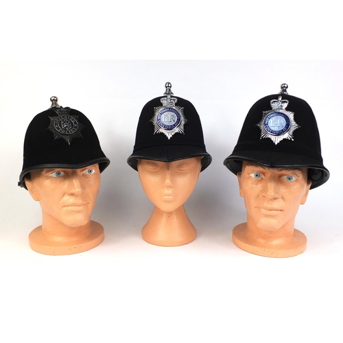 326 - Group of three vintage police Ball top helmets, comprising two Nottinghamshire Constabulary examples... 