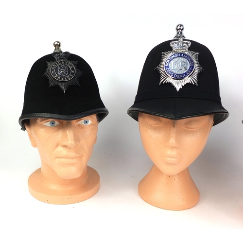 326 - Group of three vintage police Ball top helmets, comprising two Nottinghamshire Constabulary examples... 