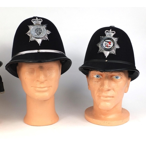 327 - Group of four vintage police Rose top helmets, comprising Avon and Somerset Constabulary, Lancashire... 