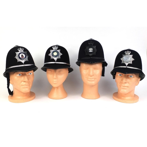 329 - Group of four vintage police Rose top helmets, comprising Worcester Constabulary, Royal Gibraltar, a... 