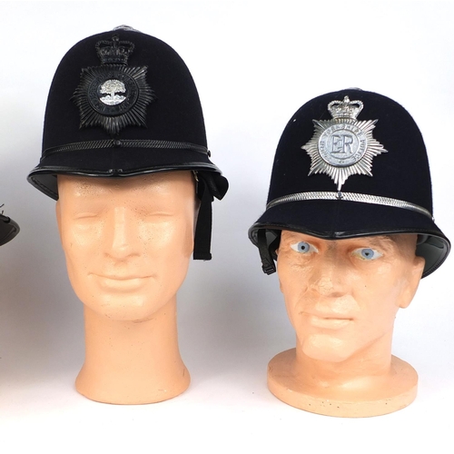 329 - Group of four vintage police Rose top helmets, comprising Worcester Constabulary, Royal Gibraltar, a... 