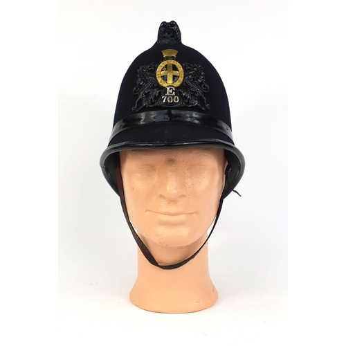 314 - Vintage City of London police Coxcomb helmet with division 'E' plate numbered 700 and leather chinst... 