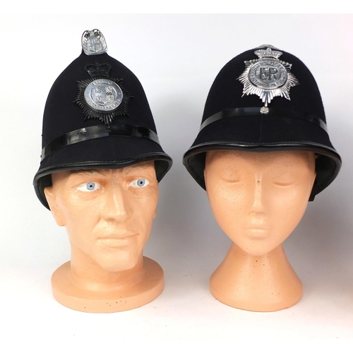 334 - Three vintage police helmets comprising a Coxcomb Durham Constabulary examples, and two Rose top Sou... 