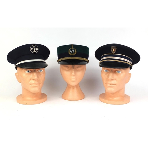 344 - Group of three vintage police caps comprising a French harbour police peak cap, Portuguese National ... 