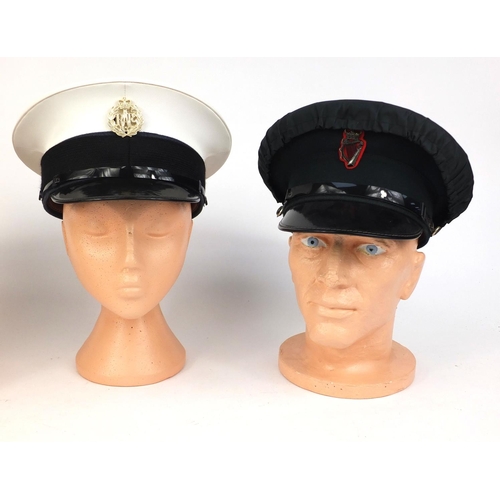 343 - Group of three peak caps comprising an RAF police example, an Irish police example and a traffic war... 