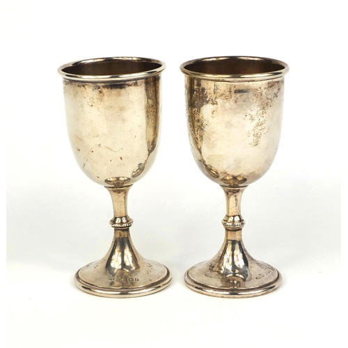 712 - Pair of small silver goblets with engraved floral decoration, indistinct makers mark Birmingham 1929... 