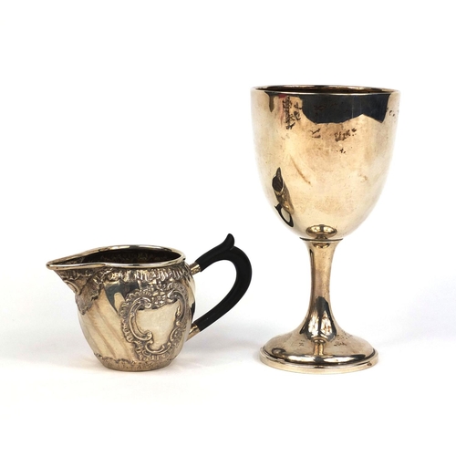 716 - Silver goblet together with an unmarked silver cream jug with ebonised wood handle, the goblet Birmi... 