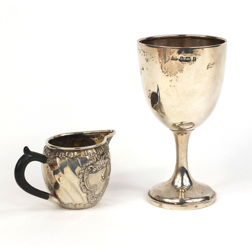 716 - Silver goblet together with an unmarked silver cream jug with ebonised wood handle, the goblet Birmi... 