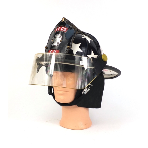 353 - American Paul Conway heritage leather fire helmet, hand painted with the stars and stripes design by... 