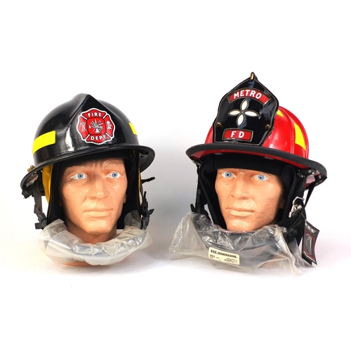 354 - Two American fire department helmets including one with Metro Fire Department leather badge, the lar... 