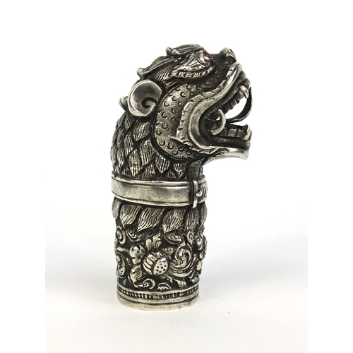 446 - Chinese unmarked silver walking stick pommel in the form of Dog Of Foo's head, wearing a collar, emb... 