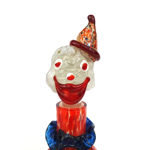 2173 - Murano colourful glass clown decanter with red and orange speckled bobble hat, paper label to the ba... 