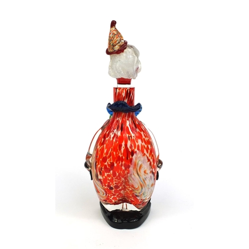 2173 - Murano colourful glass clown decanter with red and orange speckled bobble hat, paper label to the ba... 