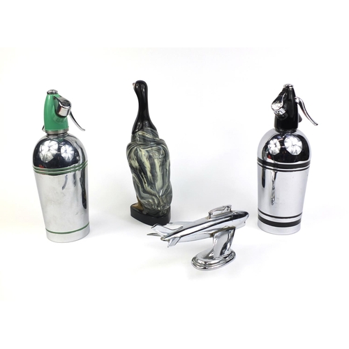 2233 - Two vintage sparklets soda siphons, Bakelite duck clothes brush and a chrome aeroplane table lighter... 