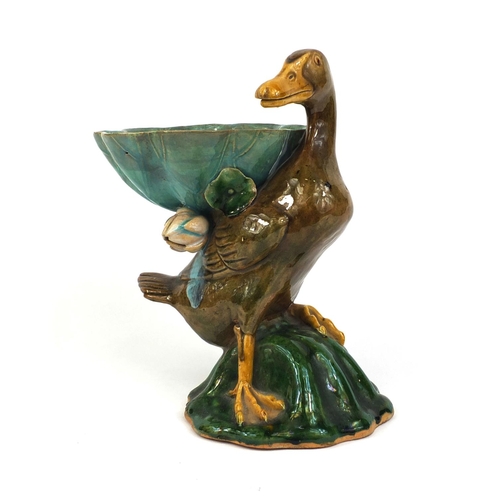 2250 - Majolica pottery duck and lily pad centrepiece, with hand painted decoration, 26cm high