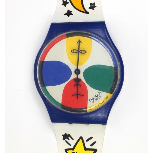 2187 - Swatch watch shop display wall clock, decorated with the moon and space ships, 195cm long