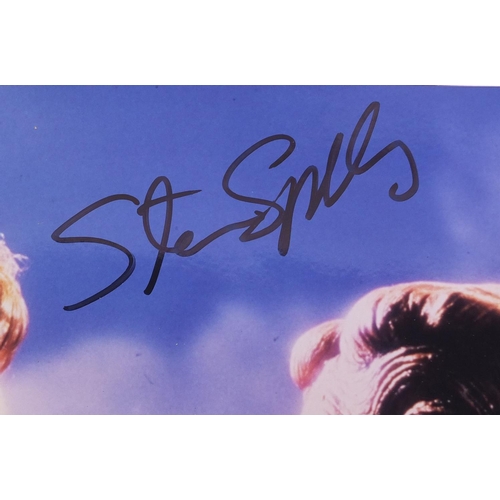 154 - Steven Spielberg signed coloured photograph of himself and E.T., with certificate of Authenticity, 2... 