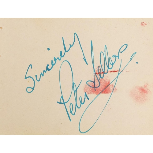 152 - Group of two signed photographs together with a autographed book page comprising Peter Sellers, Mich... 